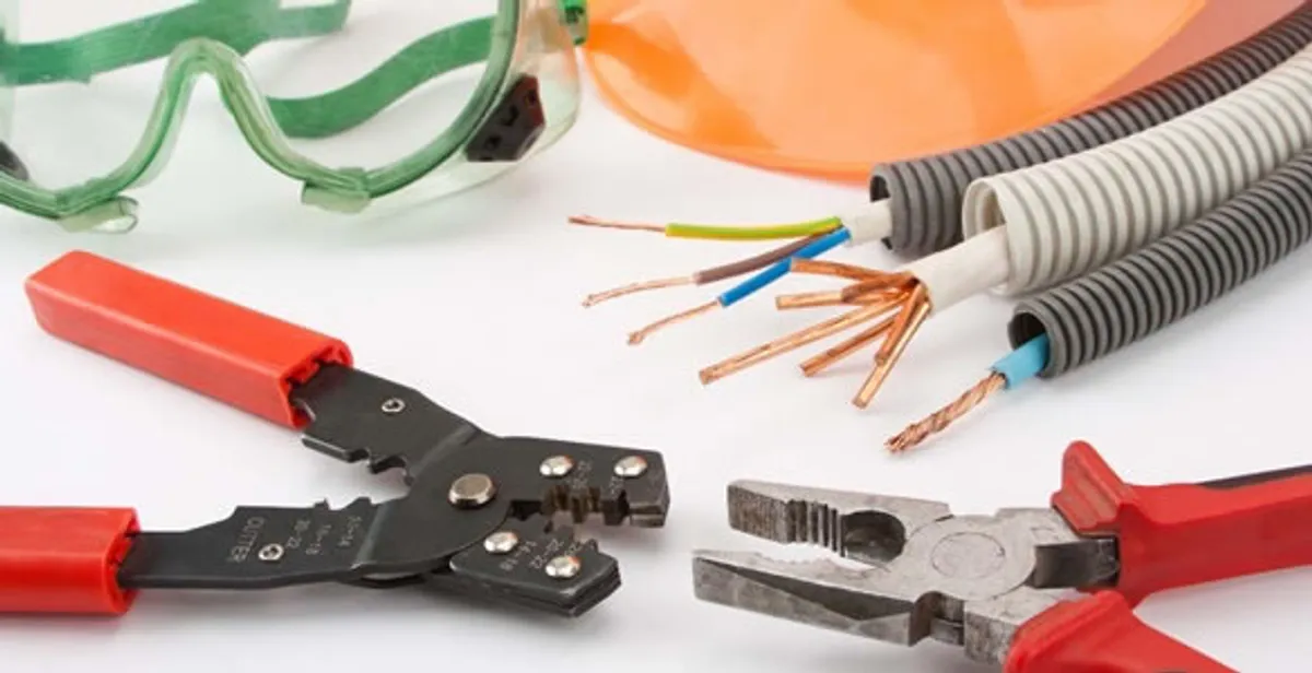 Electrical wiring repair with professional tools and safety equipment in Parkville, MD